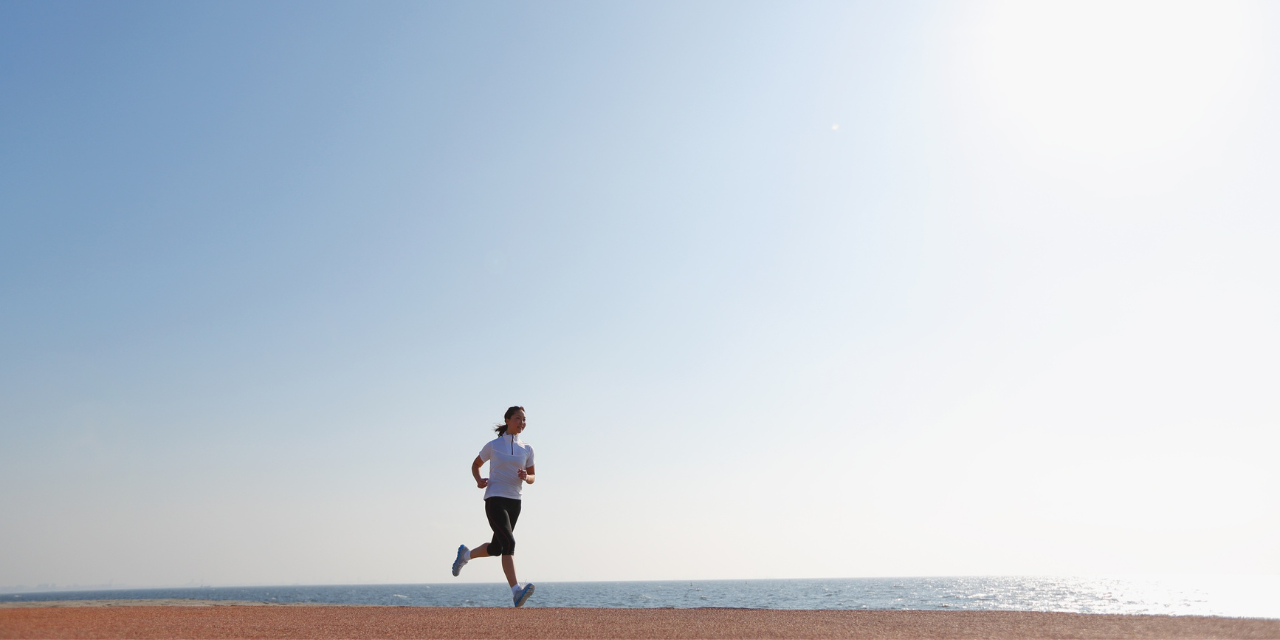 Runner on the Beach at Sunrise