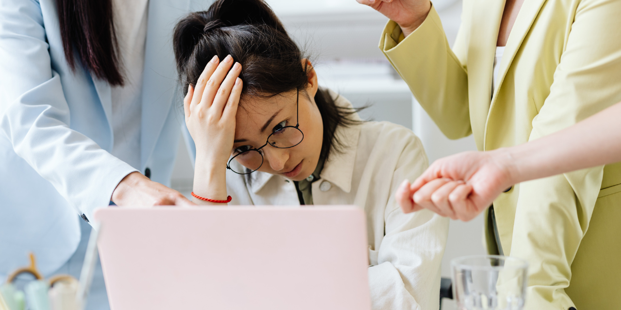 Woman Worried During an Office Discussion